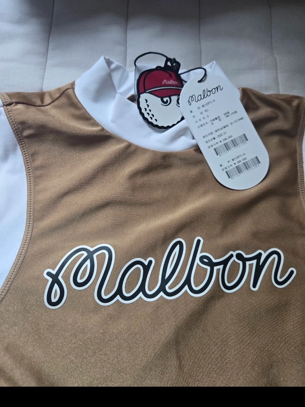 Malbon women Golf Top in Brown